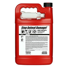 Messinas Squirrel Stopper spray being applied to a bird feeder.