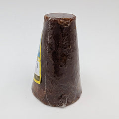Dissolving piloncillo cone into hot liquid for sauces