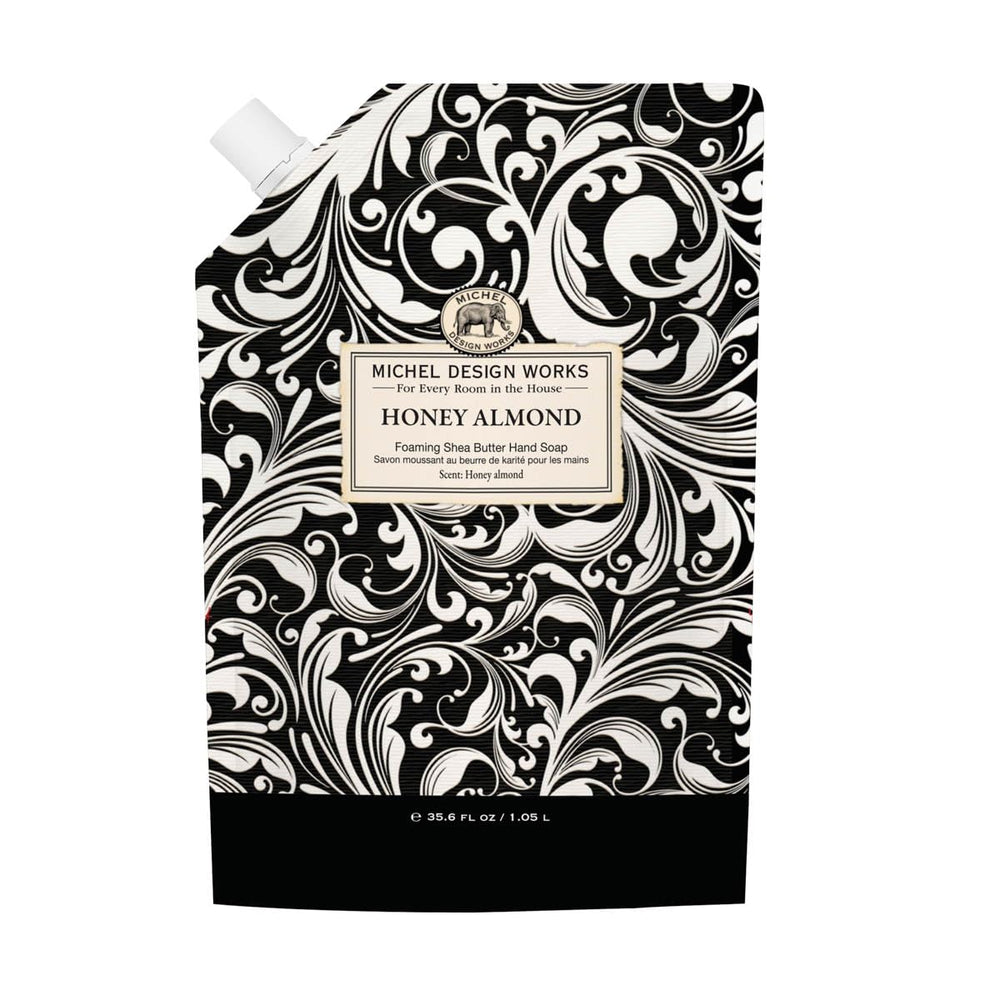 Michel Design Works Honey Almond Foaming Hand Soap bottle with rich lather for cleansing hands.