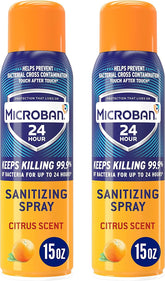 Microban sanitizing spray bottle close-up shows citrus scent and easy application