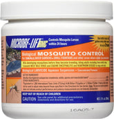 MICROBE-LIFT BMC bottle being poured to treat a decorative pond for mosquito control