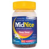 MidNite Deep Sleep gummies bottle on nightstand supports a restful night.