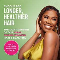 Mielle Organics Rosemary & Mint Light Hair Oil being applied to the scalp for refreshment