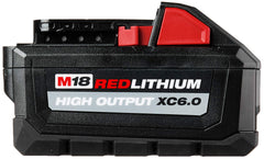 Milwaukee M18 high-output 6Ah battery handheld demonstrates ergonomic grip during extended sessions.