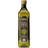 Mina Moroccan Olive Oil bottle ready for light drizzling on salads.