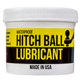Mission Automotive ball grease bottle shown on hitch components to reduce friction during towing.