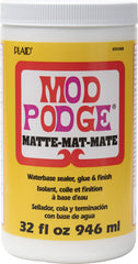 Mod Podge Matte bottle close-up showing quick-dry formula for decoupage on wood