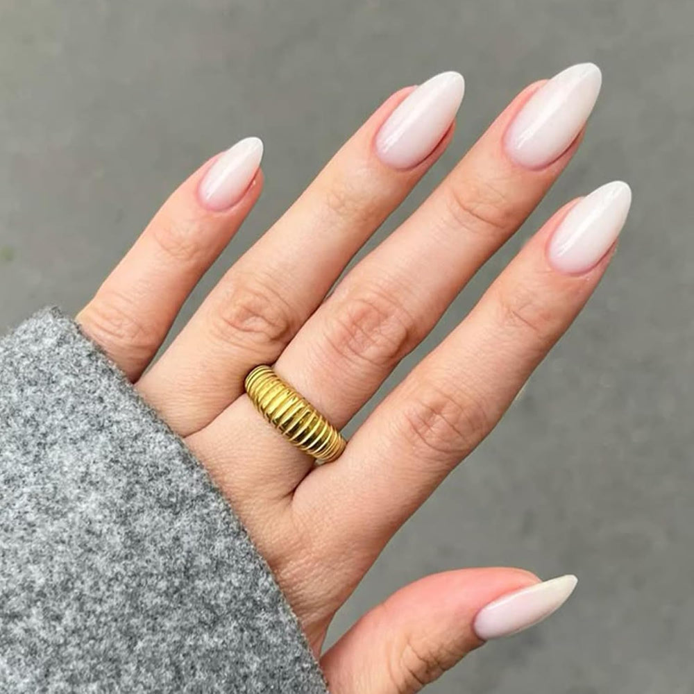 Modelones Milky White almond press-on nails for a stylish quick manicure.