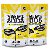 Molly's Suds Oxygen Whitener bottle pour highlighting bright whites with lemon scent