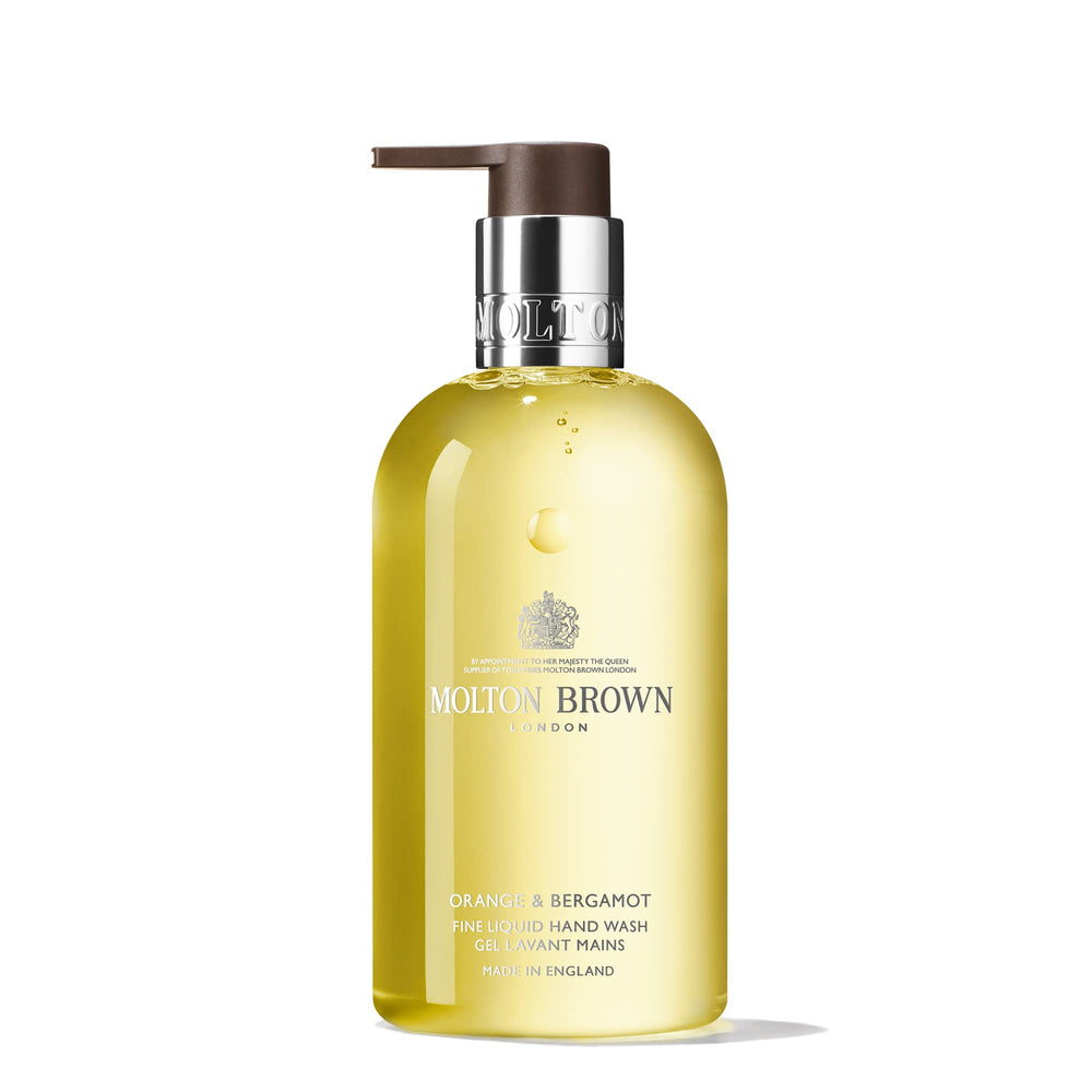 Molton Brown orange-bergamot hand wash bottle front showcasing premium citrus fragrance for daily cleansing.