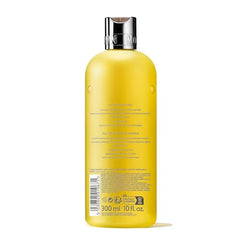 Molton Brown Purifying Shampoo lather on wet hair delivers revived fragrance