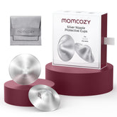Momcozy 999 silver nursing cups close-up highlighting the polished, skin-friendly material.