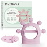 Momcozy baby teether pink closeup with textured surface for gentle gum relief.