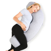 Momcozy J-shaped pregnancy pillow offering optimal side sleeping comfort