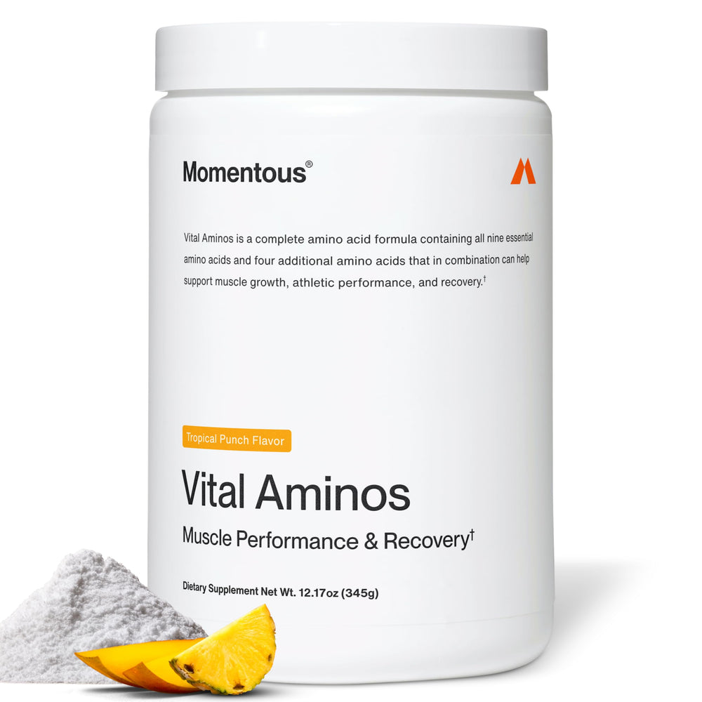 Momentous Vital Aminos Tropical Punch canister shown for post-workout recovery.