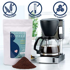 Steaming cup of Mommee Half Caf with smooth caramel flavor