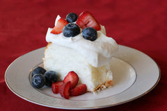Mom's Place baked angel food cake slice plated, light and fluffy texture.