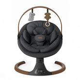 Monamii baby swing with wood grain finish calms infants while blending with decor