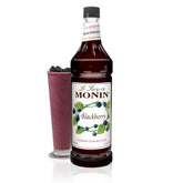 Monin Blackberry Syrup bottle label with deep purple hue, ideal for cocktails