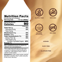 Monin Hazelnut Syrup pouring into latte to enhance flavor