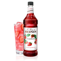 Monin Strawberry Syrup bottle front view highlighting vibrant color for cocktails