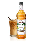 Monin Vanilla Syrup bottle pour showcasing real Madagascar vanilla for cafe-style drinks