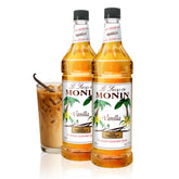 Monin Vanilla Syrup bottle showcases Madagascar vanilla flavor for coffee and desserts.