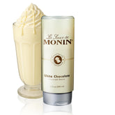 Monin White Chocolate Sauce latte pour highlights creamy texture for premium coffee
