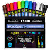 MoodClue liquid chalk marker neon pink on glass board for vibrant erasable notes.