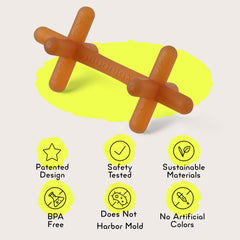 Moonjax teether in a clean setting demonstrates dishwasher-safe care.