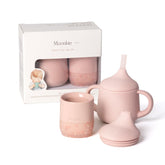 Moonkie blush open cup on table for easy transition to independent drinking.