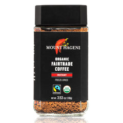 Mount Hagen instant coffee dissolving in cold water for quick iced coffee.
