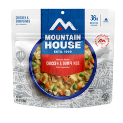 Mountain House survival meal pouch with chicken and vegetables in white gravy for backcountry dining.