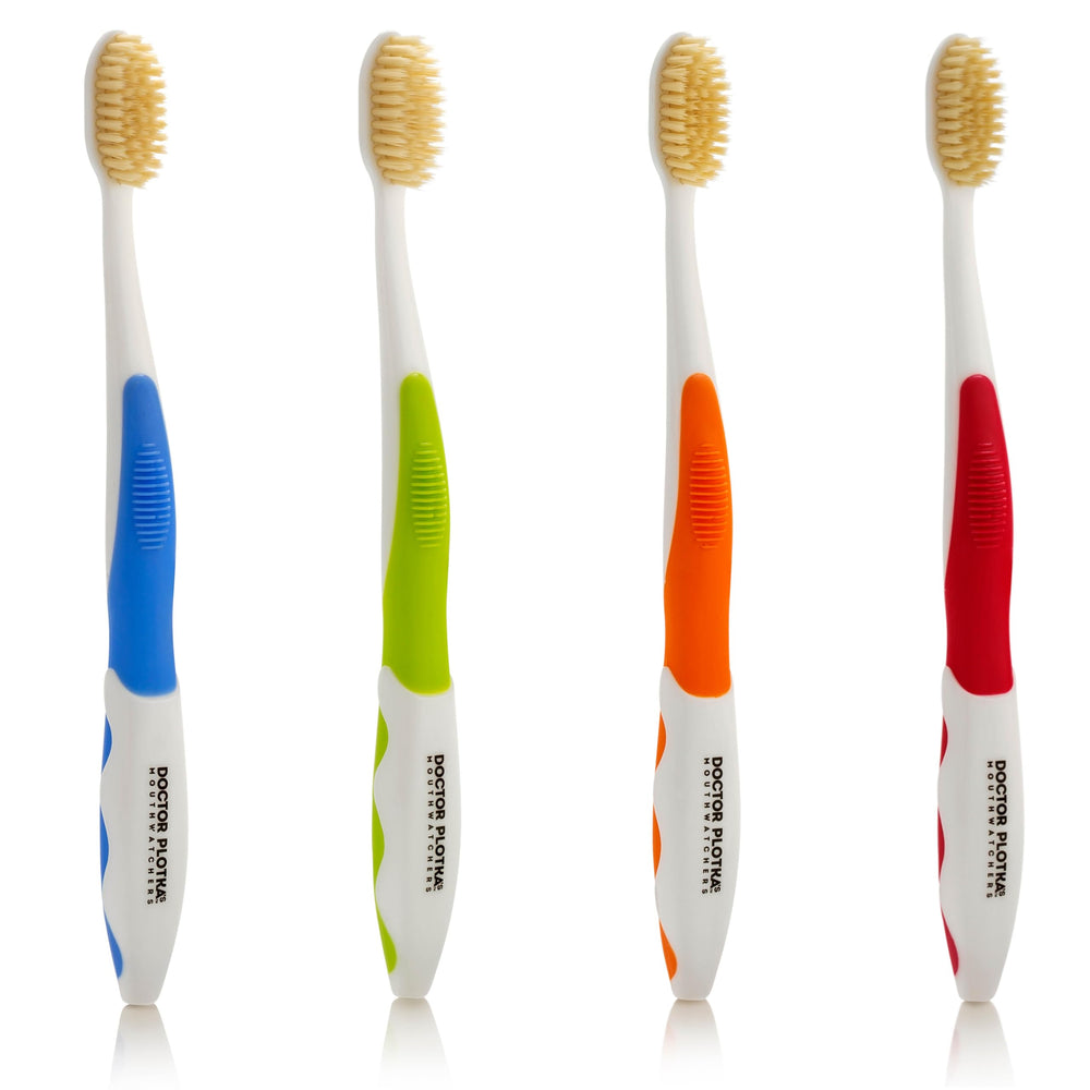 Mouthwatchers Dr Plotka's soft-bristle brush close-up shows gentle cleaning.