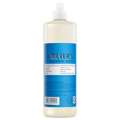 Blueberry dish soap being poured from Mrs. Meyer's bottle for grease-cutting action.