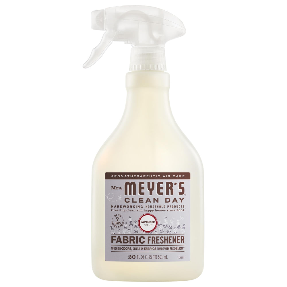Mrs. Meyer’s Clean Day Lavender fabric freshener bottle refreshes fabrics with garden-inspired scent.