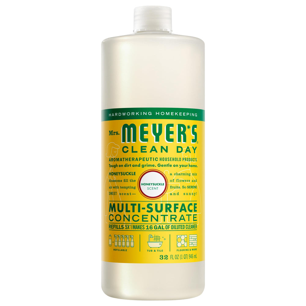 Mrs. Meyer's Clean Day honeysuckle bottle on a sunny counter for a refreshing scent