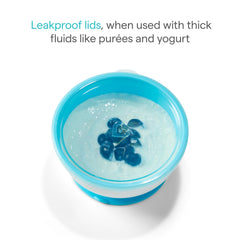Munchkin Stay Put set in use during mealtime with colorful bowls.
