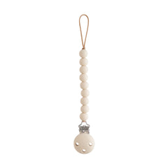 Mushie Hera pacifier clip packaging for easy gifting and travel-ready organization.