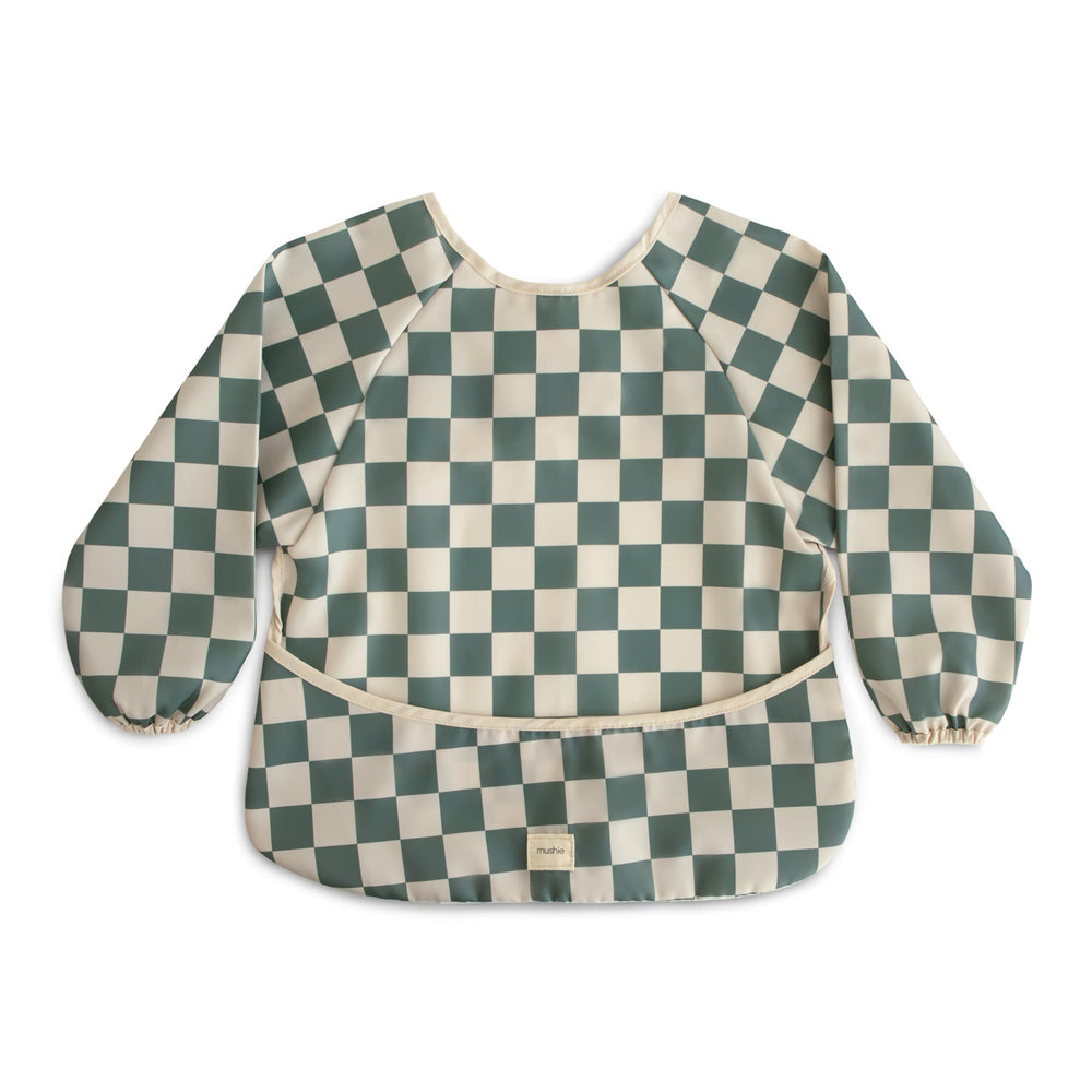 Mushie long sleeve bib olive check front view offers full coverage to protect outfits.