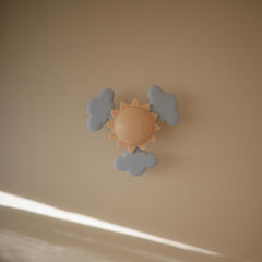 Mushie Sunshine Suction Spinner Toy spins softly to support visual tracking during play.