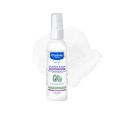 Mustela baby diaper rash spray bottle shown for quick touch-free application