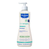 Mustela Stelatopia bottle-pour demonstrates tear-free cleansing for delicate baby skin.
