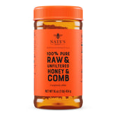 Nate's Honey raw honeycomb jar closeup highlighting natural texture and color for snacking.