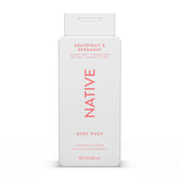 Native Body Wash Grapefruit Bergamot bottle pour for a refreshing cleanse.