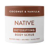 Native detoxifying exfoliating body scrub jar shows coconut-vanilla scent for smooth skin