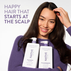 Hands massaging Native Scalp Detox Shampoo into the scalp