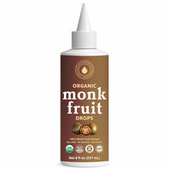 NatriSweet organic monk fruit liquid bottle pouring for zero-calorie sweetness in drinks.