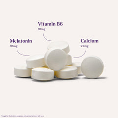 Natrol Melatonin bottle on nightstand setup suggests nightly routine before sleep.
