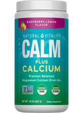 Natural Vitality CALM raspberry lemon powder dissolving in water for relaxation.
